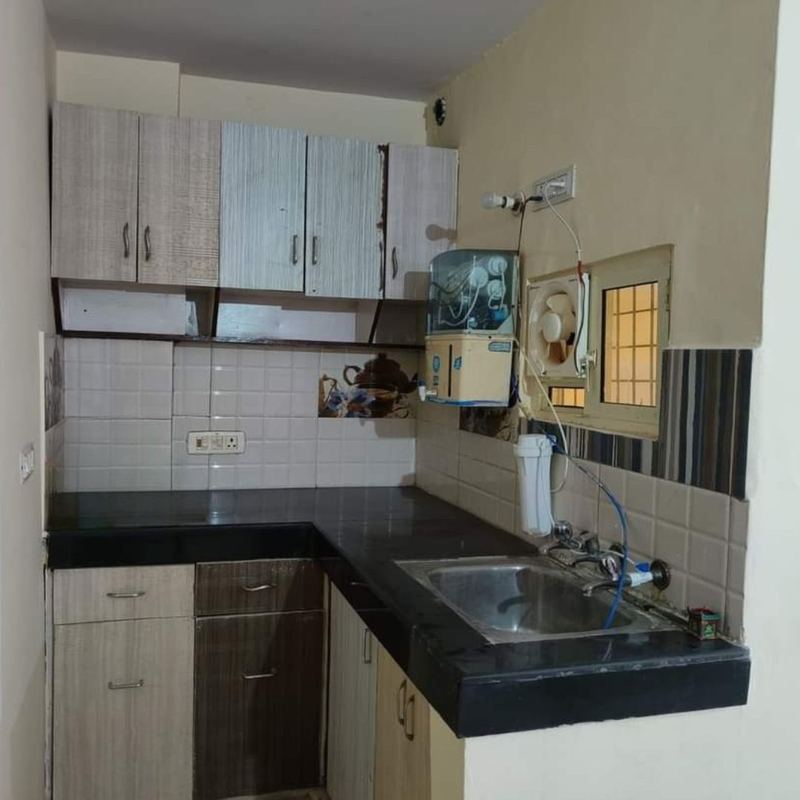 Common kitchen with RO water purifier and induction at Akasa PG Dwarka